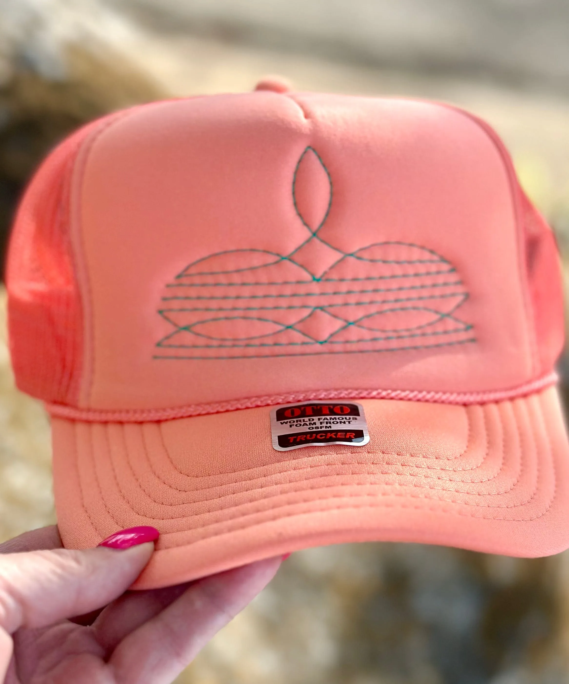 The Coral Trinidad Bootstitch Trucker Cap