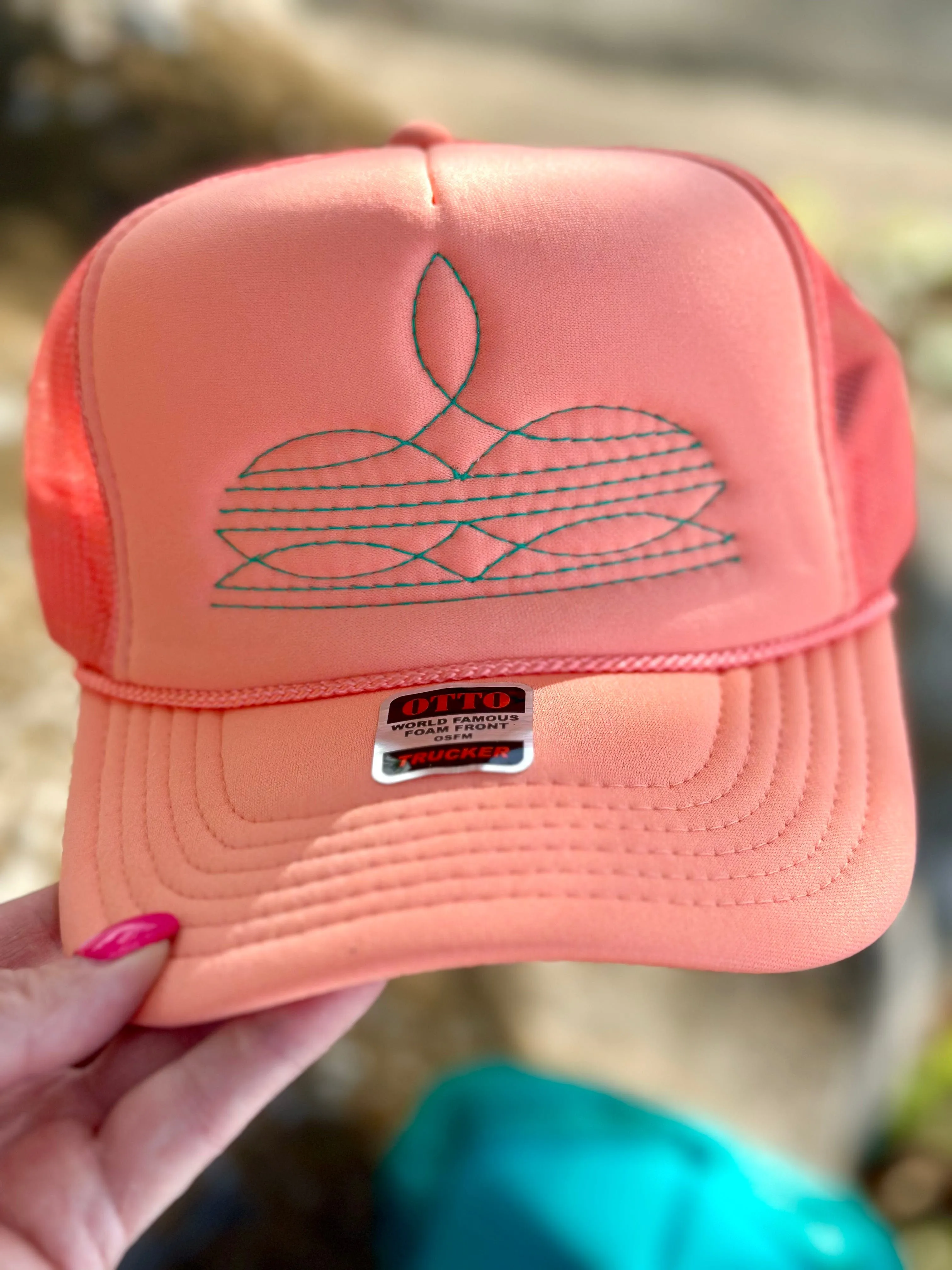 The Coral Trinidad Bootstitch Trucker Cap